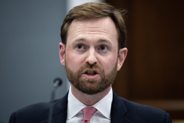 Trumps-FTC-may-impose-merger-condition-that-forbids-advertising-boycotts.jpg FTC Chairman Andrew Ferguson speaking into a microphone while sitting at a table.