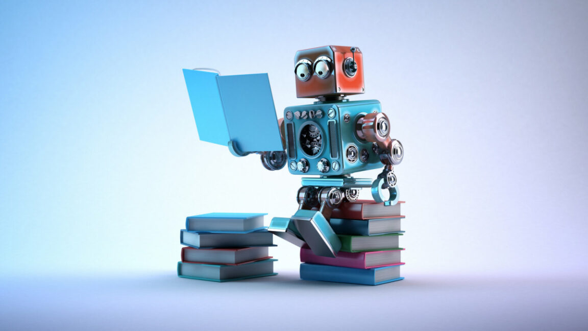 1752539823_New-Grok-AI-model-surprises-experts-by-checking-Elon-Musks.jpg Robot sitting on a bunch of books, reading a book.