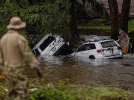 earch and rescue workers search near debris looking for any survivors or remains of people swept up in the flash flooding on July 6, 2025 in Hunt Texas.