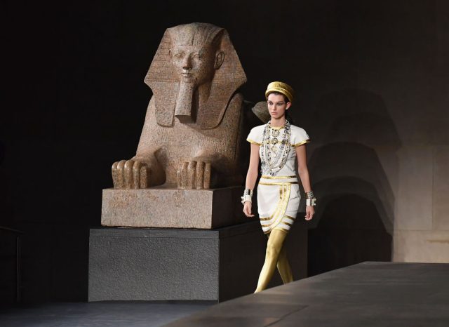 Chanel-Will-Return-to-New-York-City-with-Metiers-dArt-Collection.jpg A model walks the runway during the Chanel Metiers D'Art 2018/19 Show at The Metropolitan Museum of Art on December 4, 2018 in New York City. (Photo by Angela Weiss / AFP) (Photo credit should read ANGELA WEISS/AFP via Getty Images)