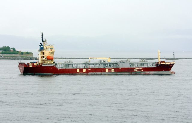 Meet-the-cement-transport-ship-that-makes-cement-ingredients-while.jpg The UBC Cork sails near Norway.