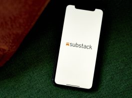The Substack logo on a smartphone