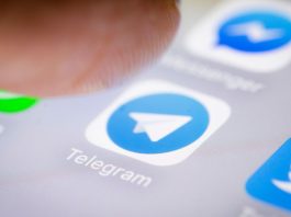 Photo illustration of the Telegram app icon on a smartphone