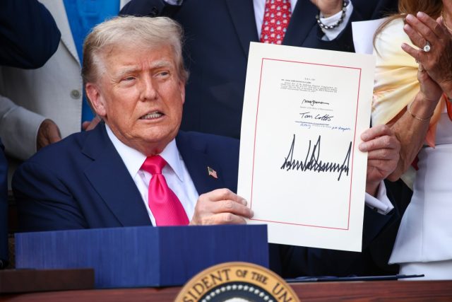 Trump-administration-to-spend-1-billion-on-offensive-hacking-operations.jpg U.S. President Donald Trump, joined by Republican lawmakers, signs the One, Big Beautiful Bill Act into law during an Independence Day military family picnic on the South Lawn of the White House on July 04, 2025 in Washington, DC.